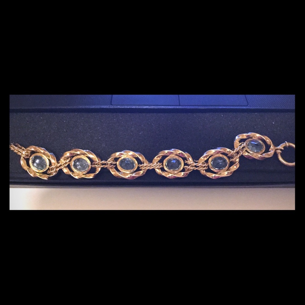 “Gold Bracelet w/light Blue Topaz Stones”
